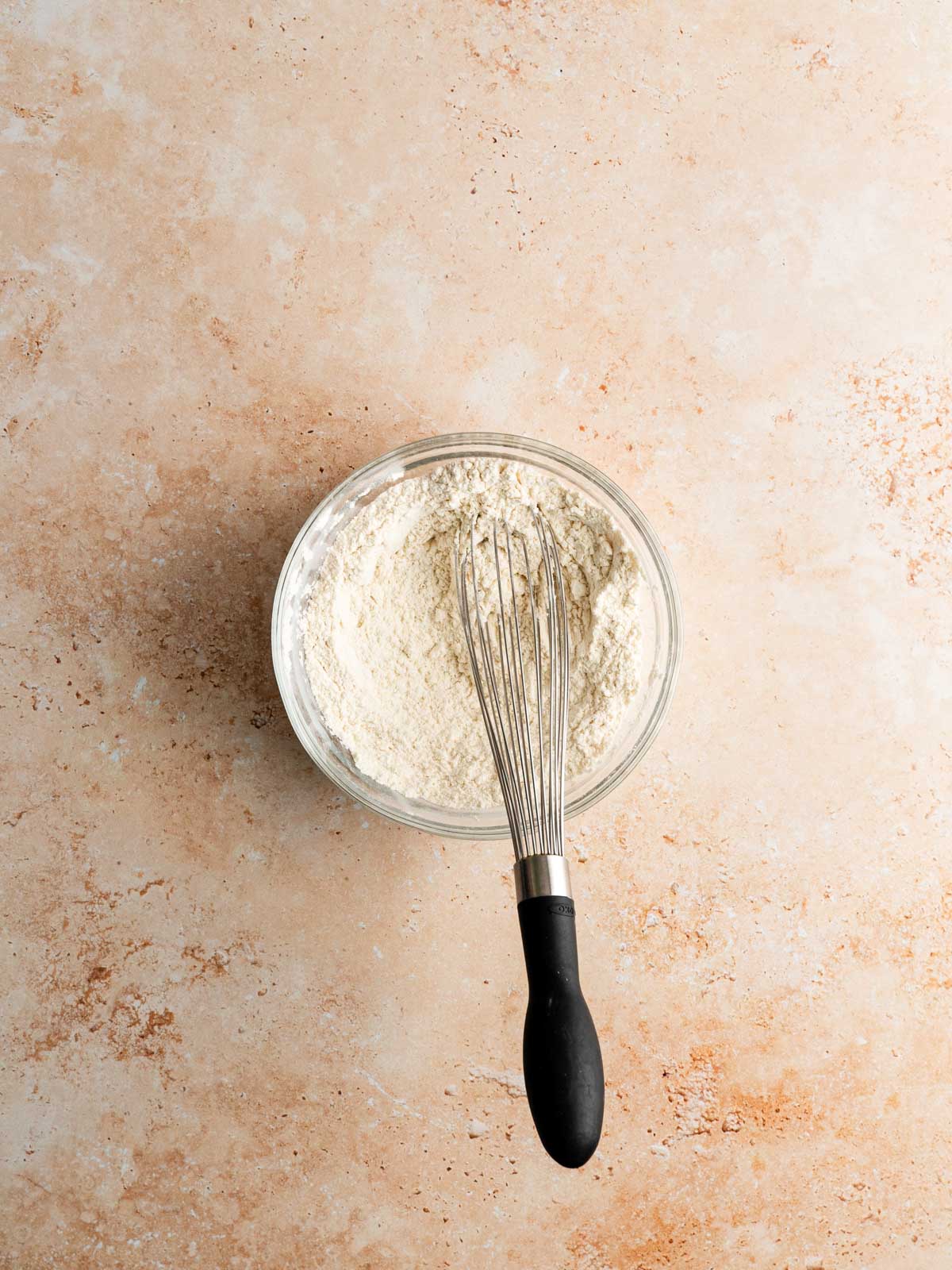 Dry ingredients whisked in a bowl.