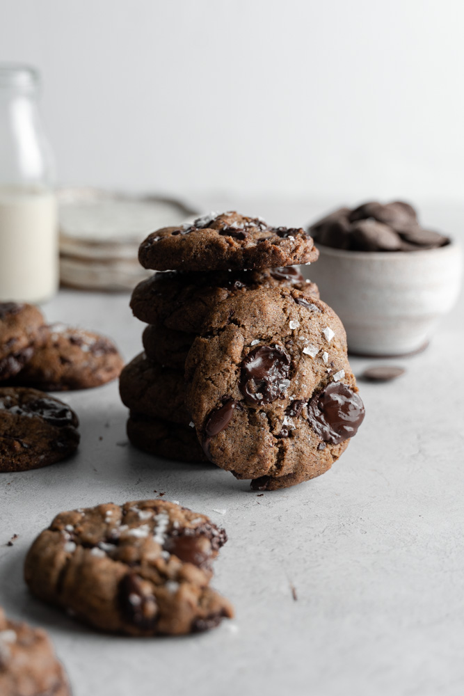 Front view of the. cookies stacked ontop of each other, and one set to the side of the stack.