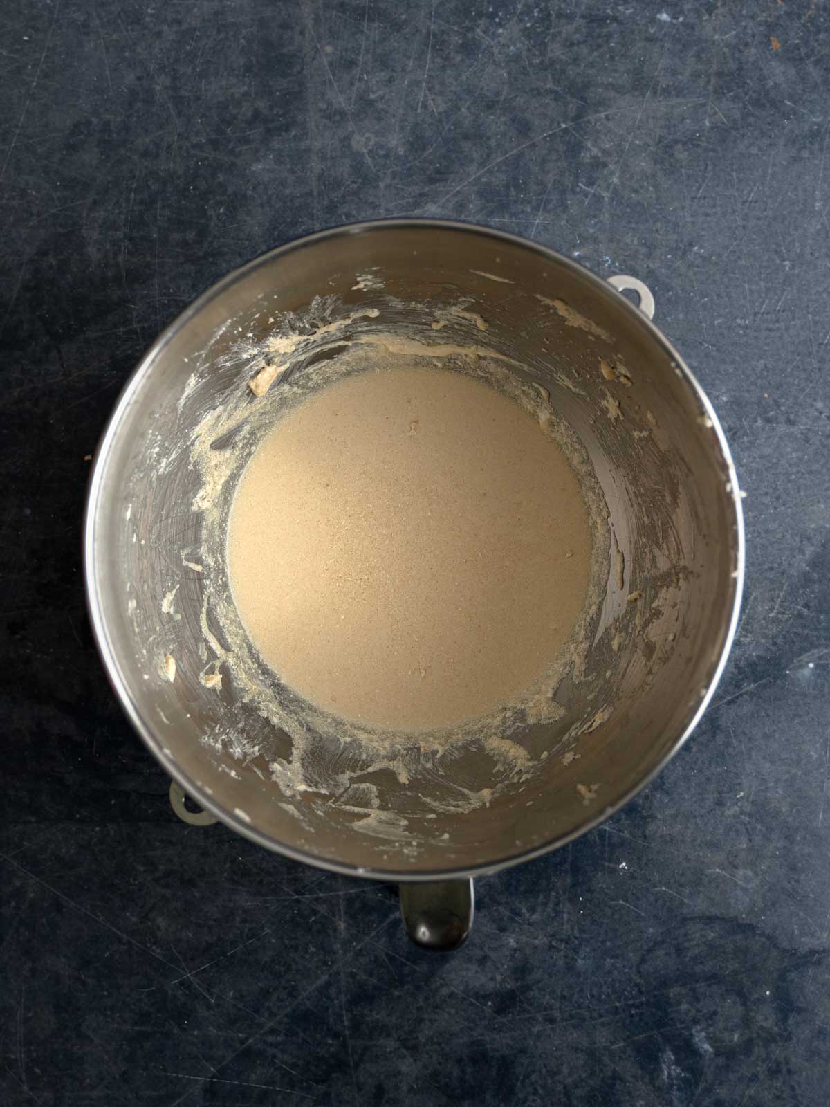 Dairy-free milk and vanilla added to the butter and sugar, and mixed.