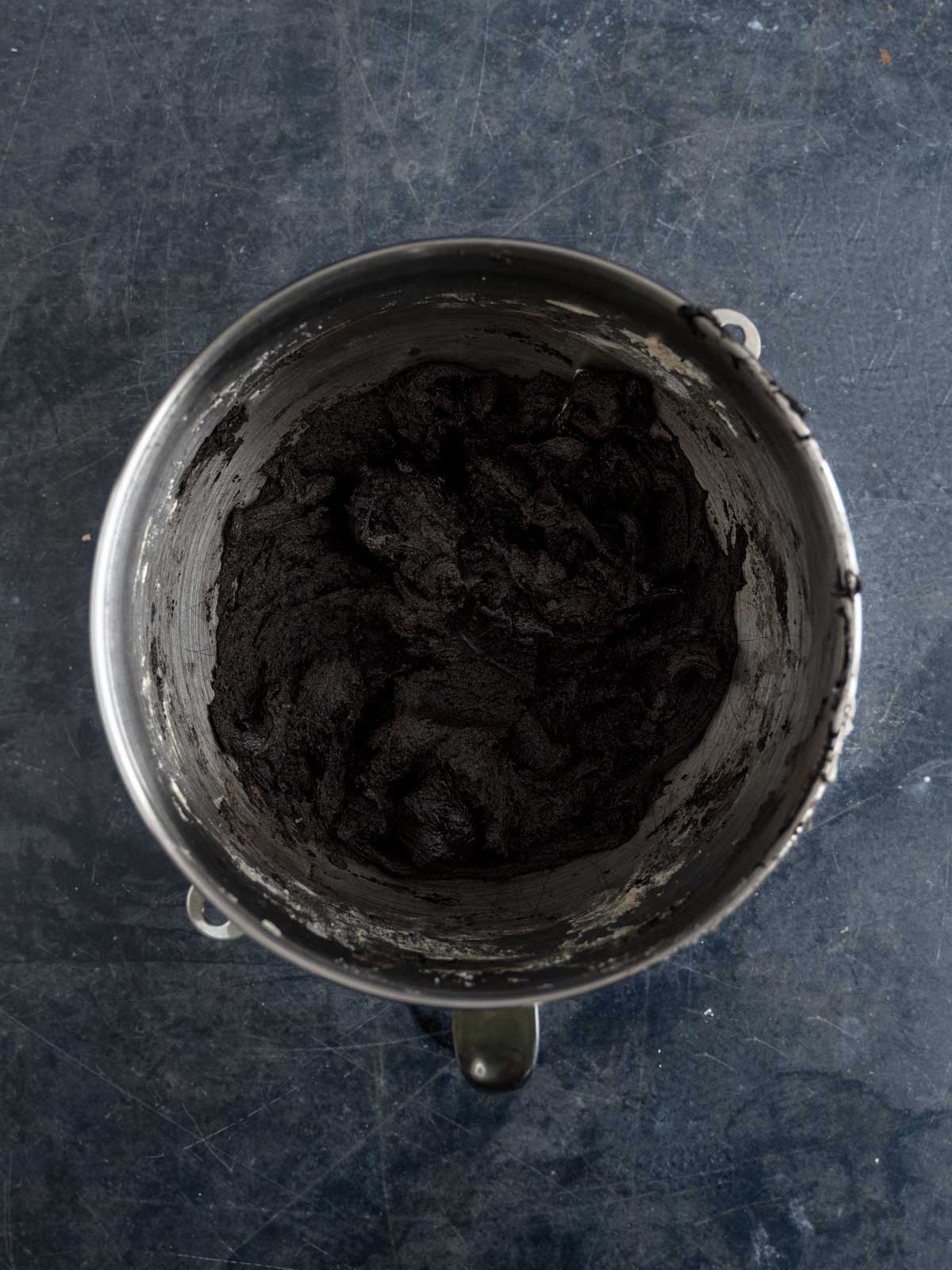 Dry ingredients added to the wet ingredients to create a black cocoa cookie dough.