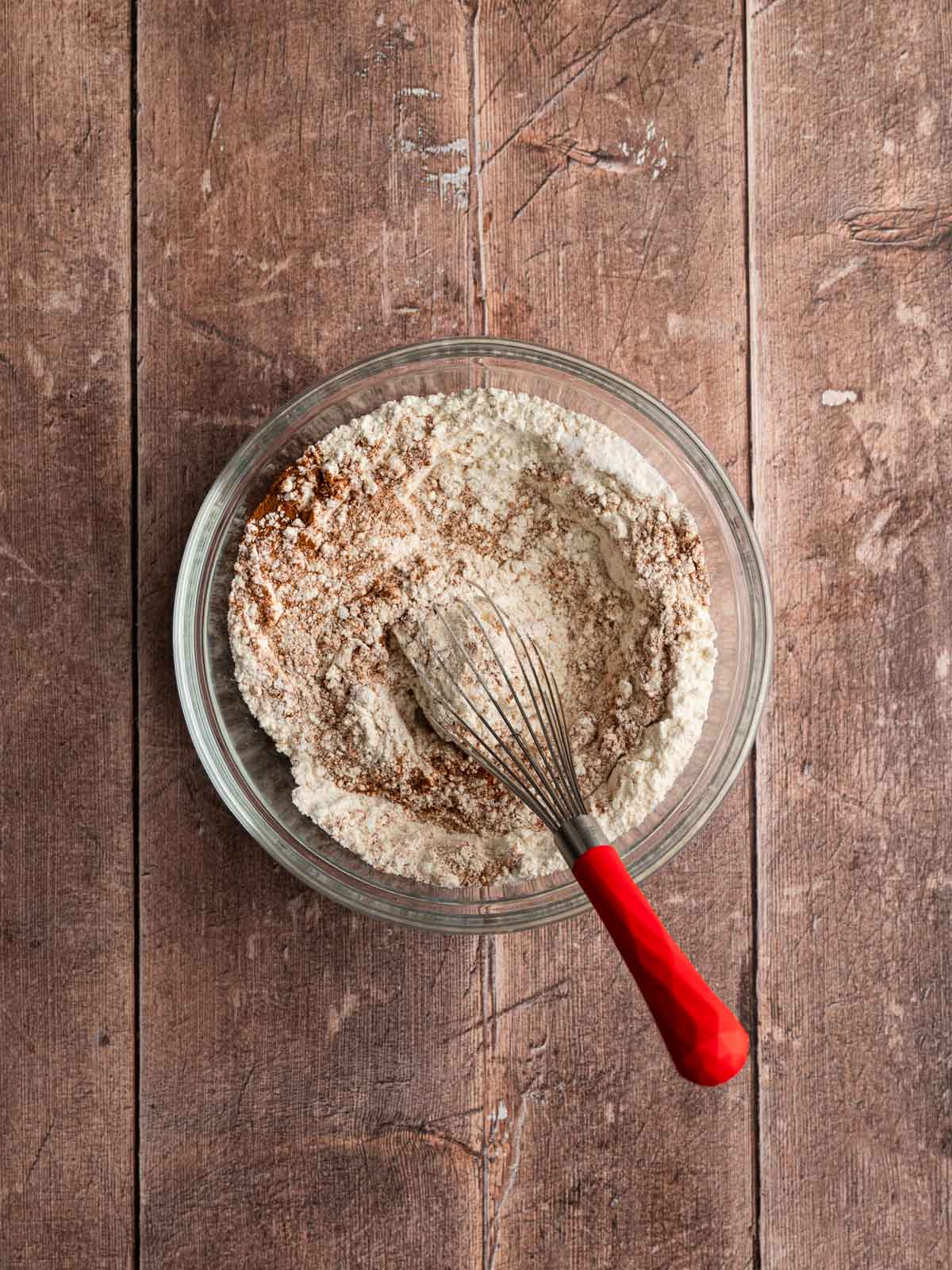 Dry ingredients whisked in a bowl.