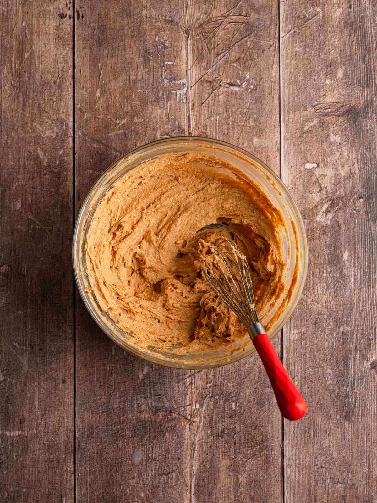 Sugar, pumpkin puree, and vanilla added to the bowl, and whisked until smooth.