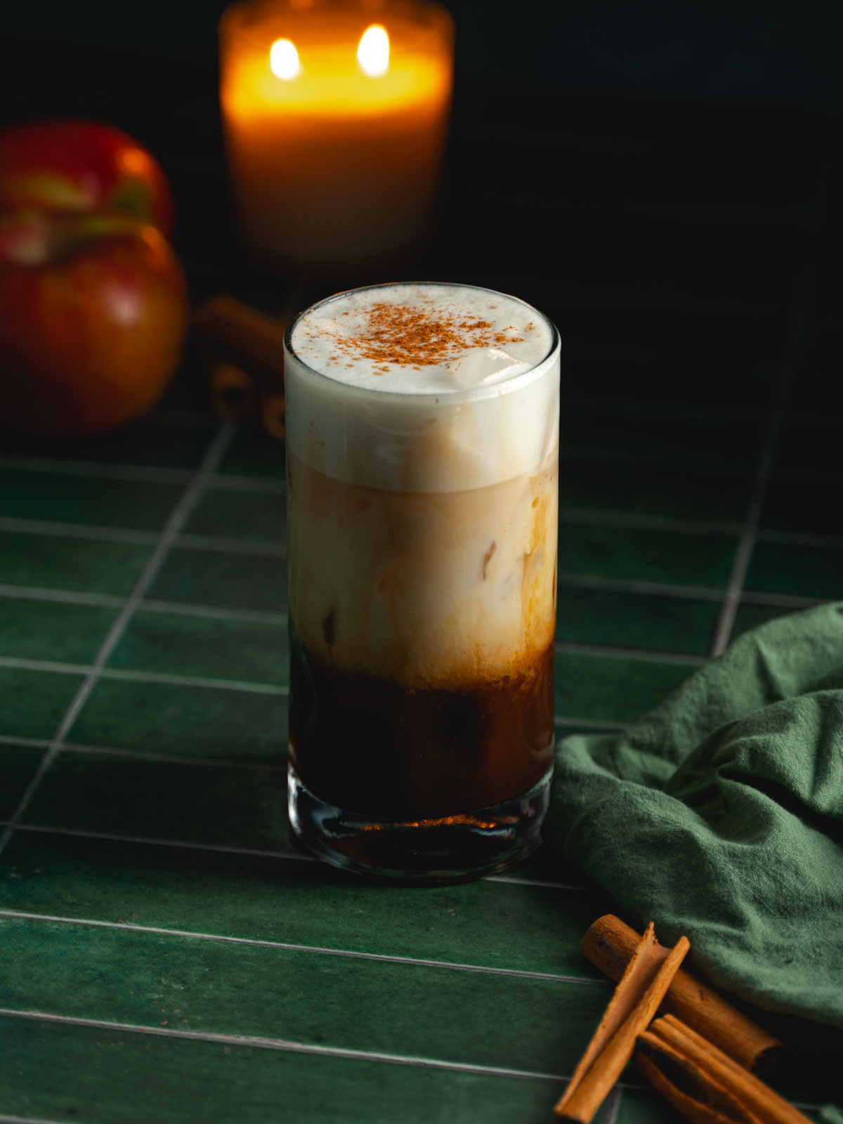 A tall glass of a better apple crisp shaken espresso.