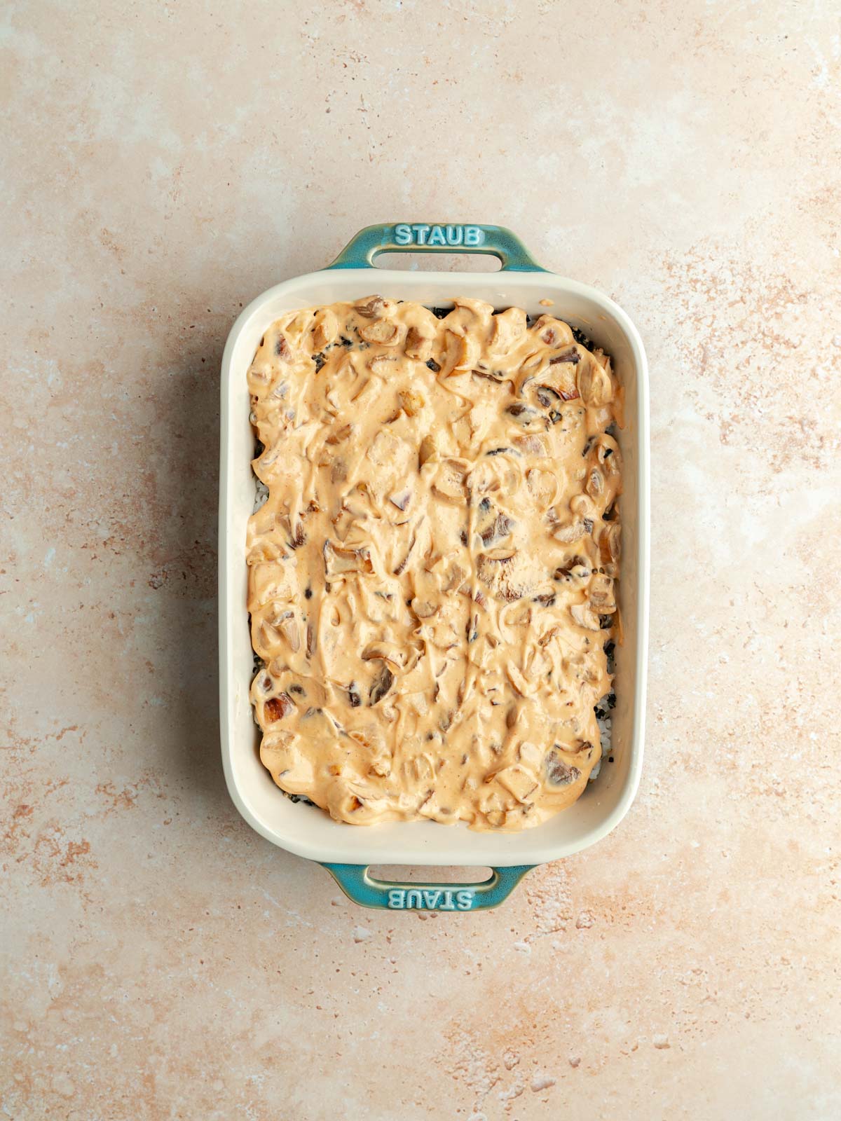 Srirach mayonnaise mix with cooked oyster mushroom spread over top of furikake and rice.
