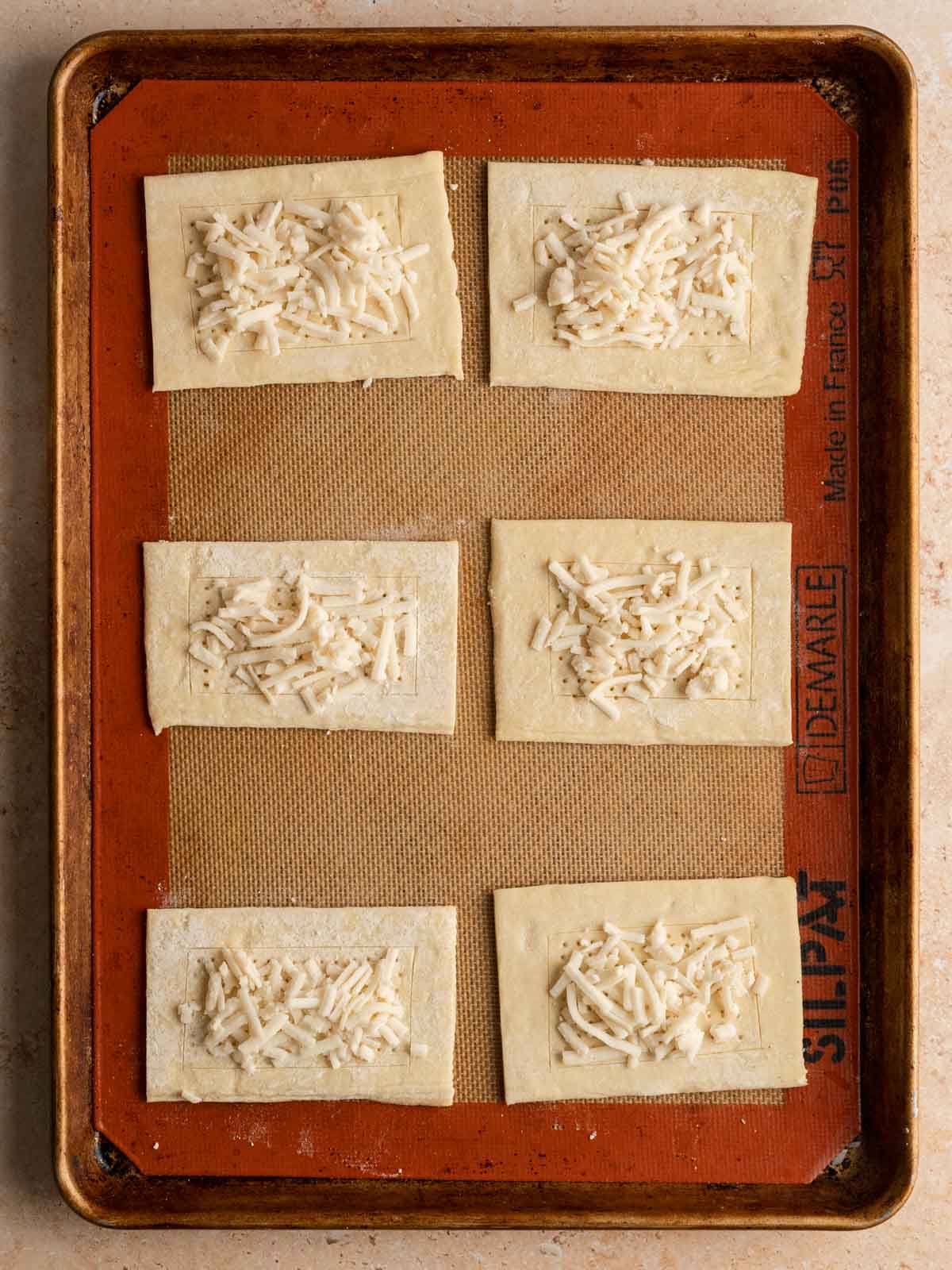 Vegan cheese added to the puff pastry.