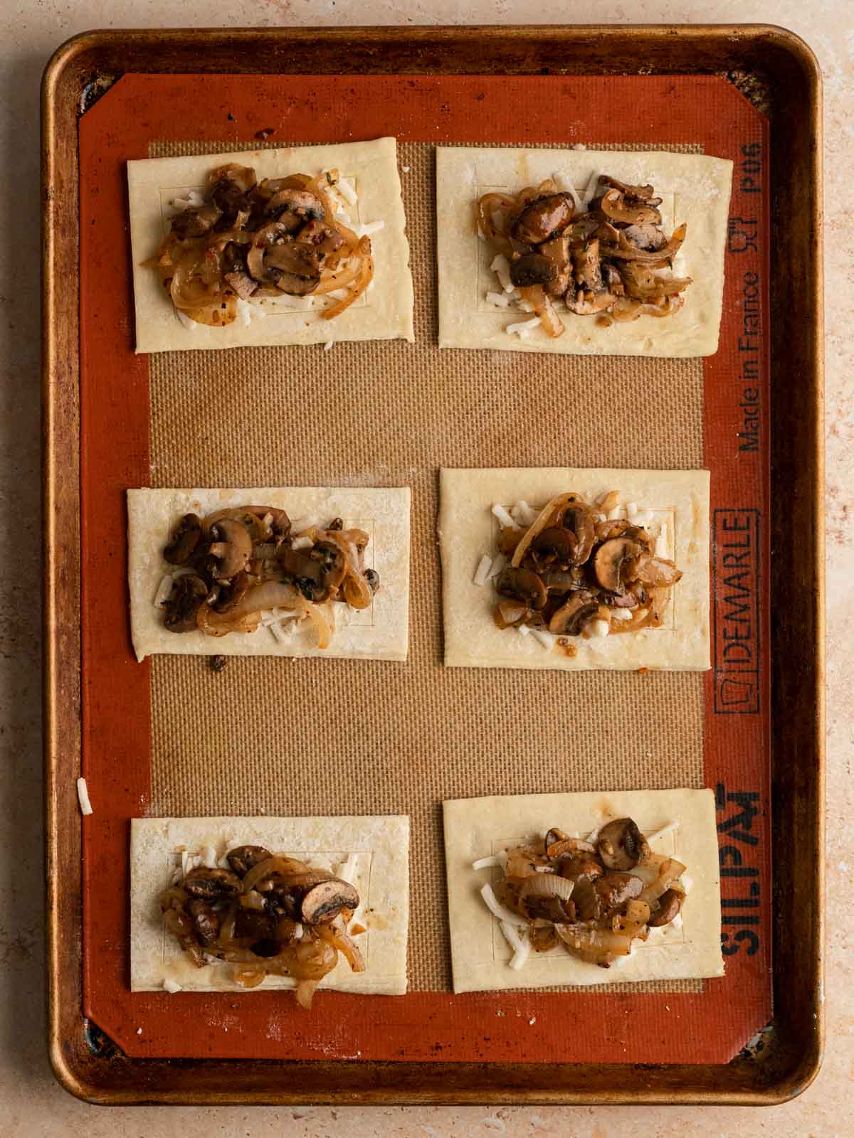 Mushroom filling laid over top the vegan cheese.