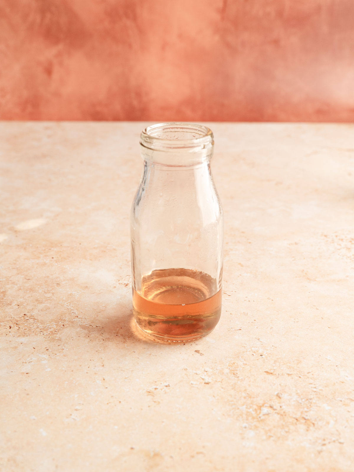 A container of rose syrup.