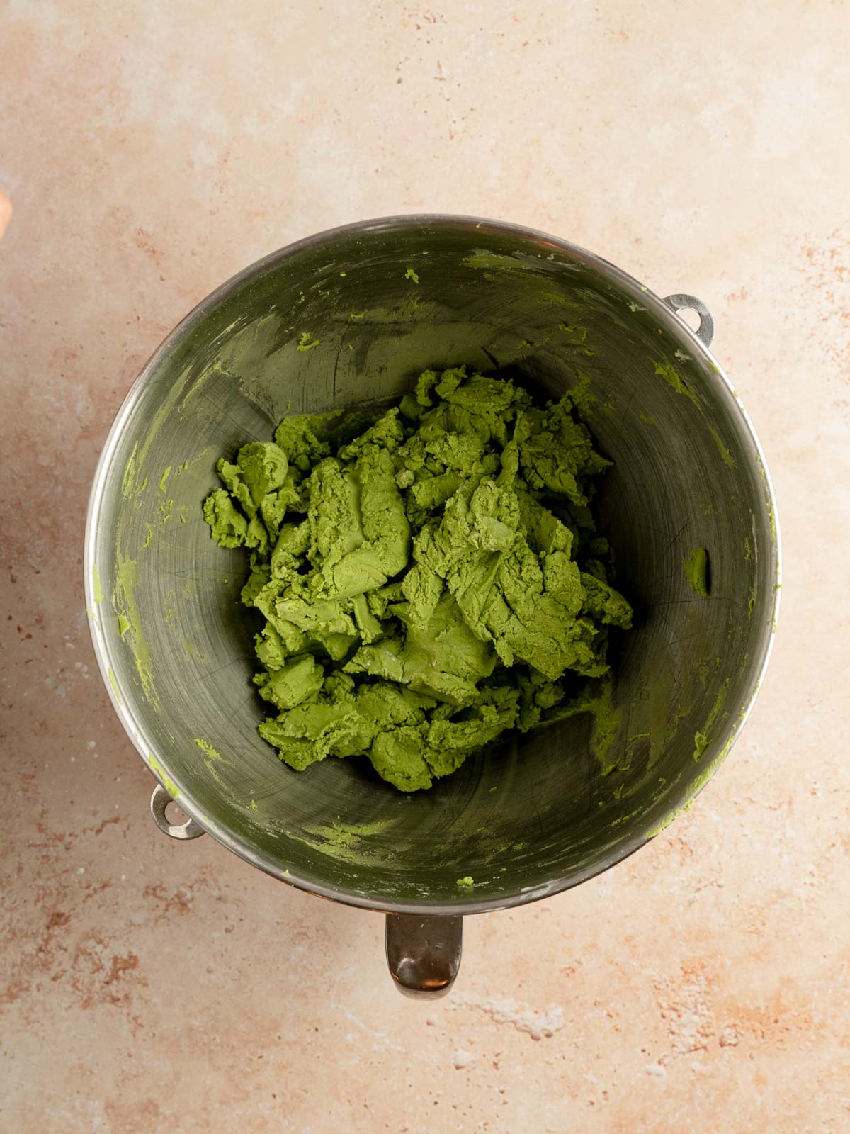 Matcha cookie dough in a bowl.