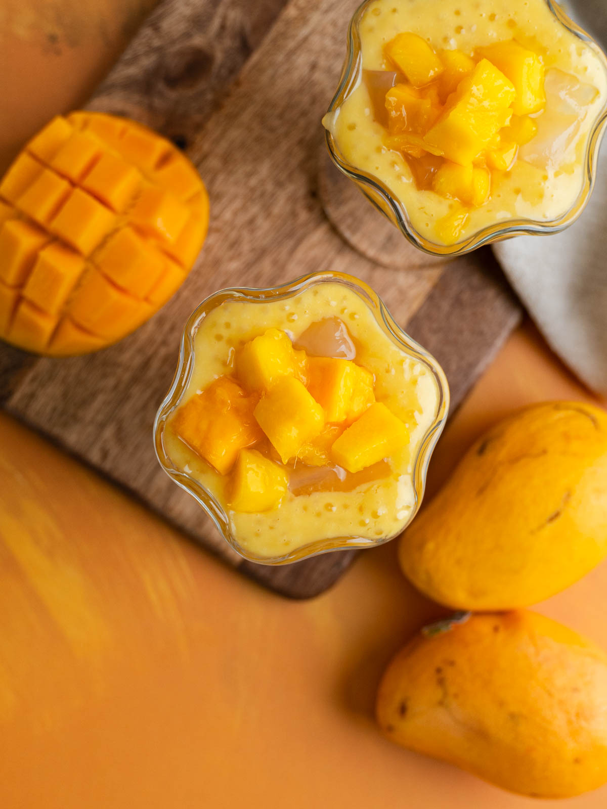 Top view of mango sago in a sundae cup.