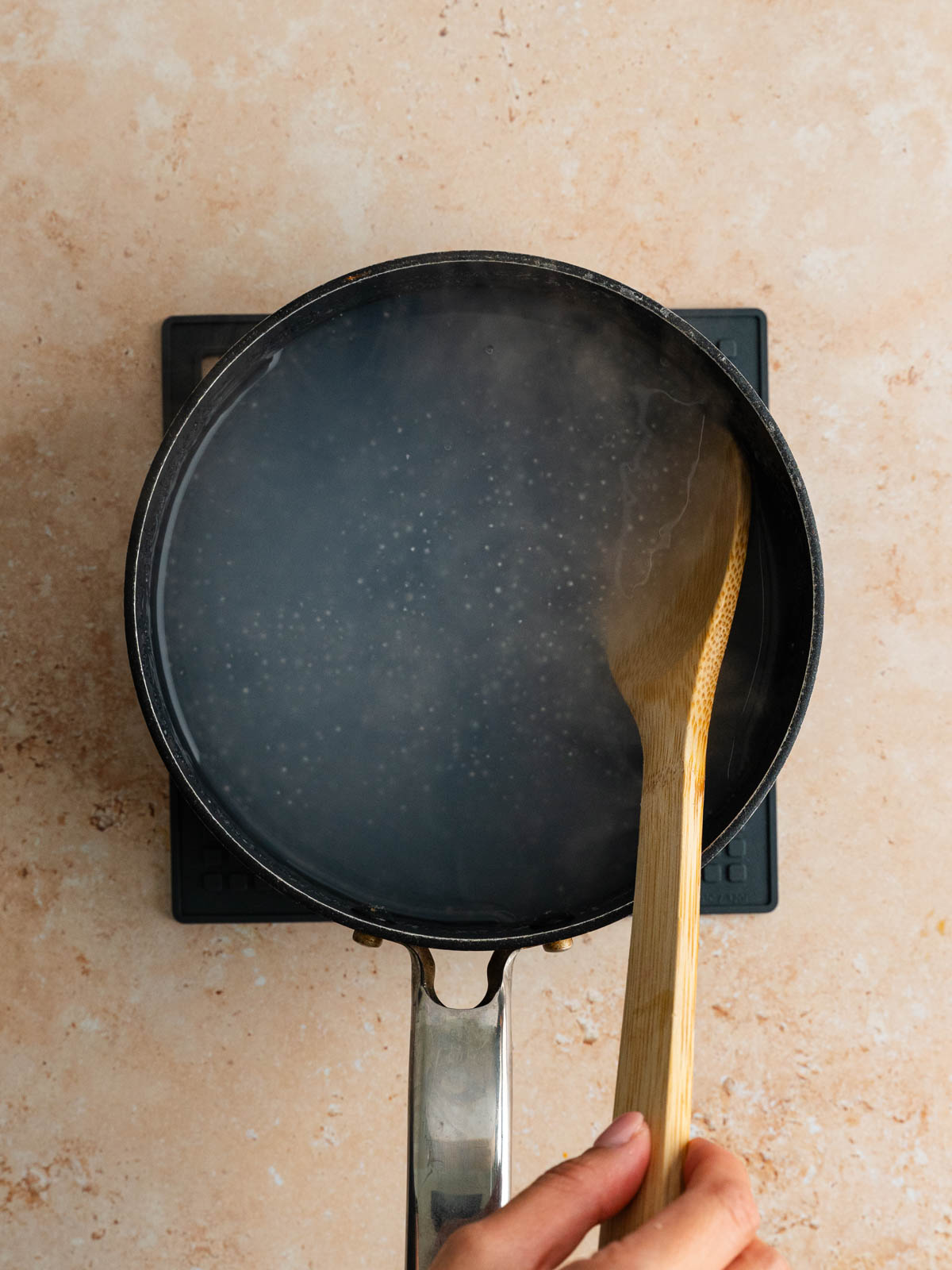 Mini tapioca pearls cooked in a saucepan.