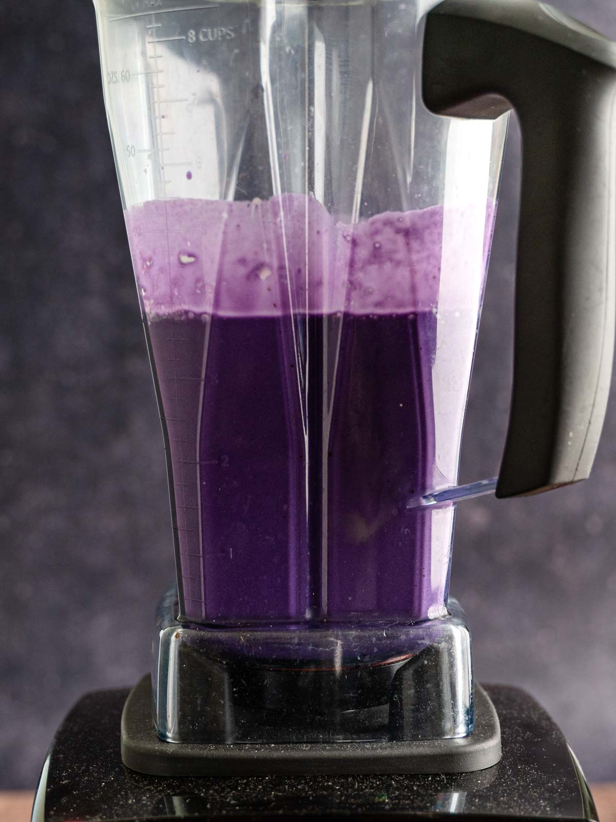 Ube flan mixture in a blender.