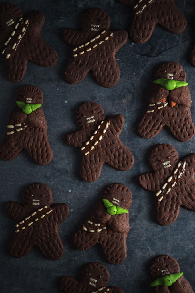 Top view of many wookie cookies lying on top of a work surface.