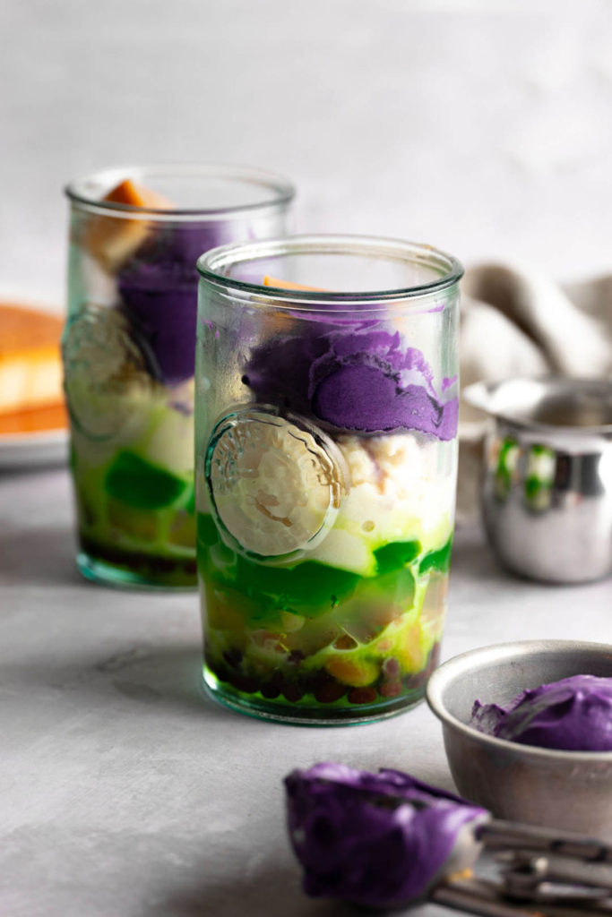 Front view of two tall glasses of halo-halo