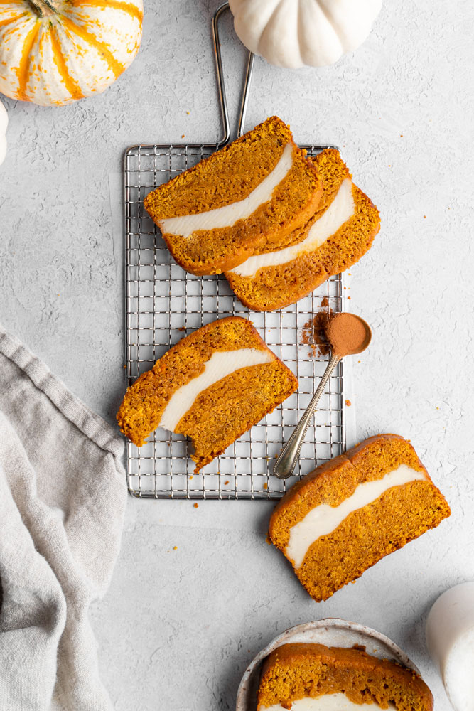 Top view of slices of pumpkin cheesecake bread.