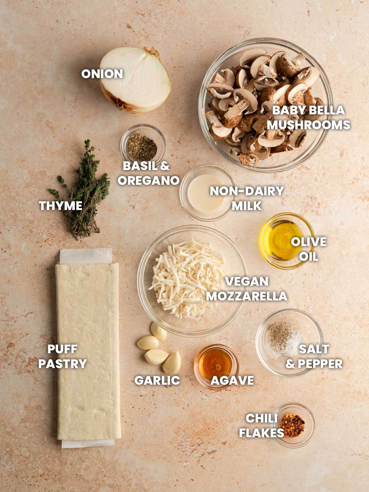 Ingredients for cheesy vegan mushroom tarts.