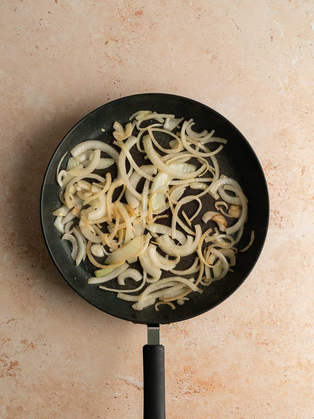 Garlic and onions in a saute pan.