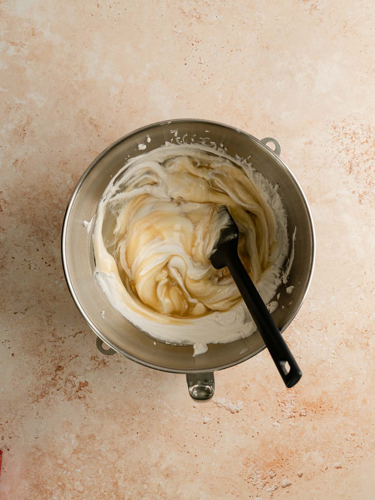 Coconut condensed milk, vanilla extract and salt folded in the dairy-free whipping cream.