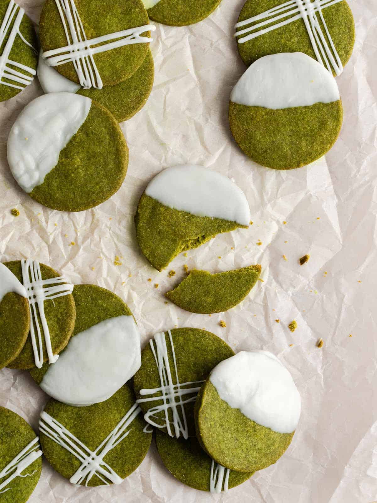 A broken vegan matcha shortbread cookie.