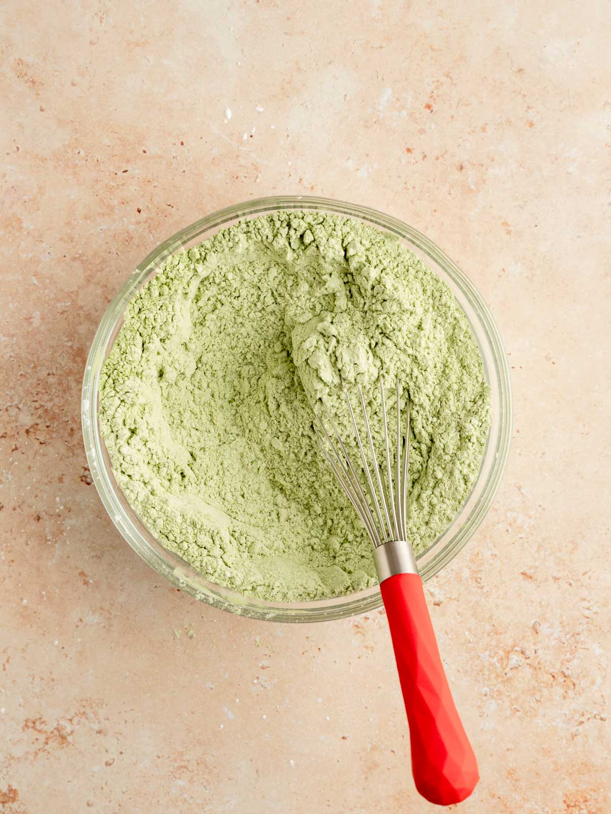 Dry ingredients whisked in a bowl.